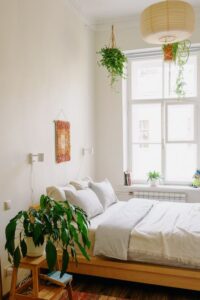 white bed with pillows